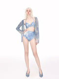 Elegant Blue Tie-Dye Bikini Set with Sheer Cover-Up image 0